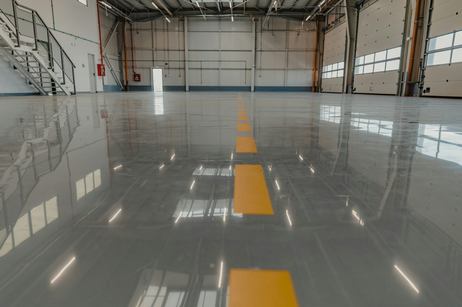 Epoxy and waxed flooring with colorful signage.